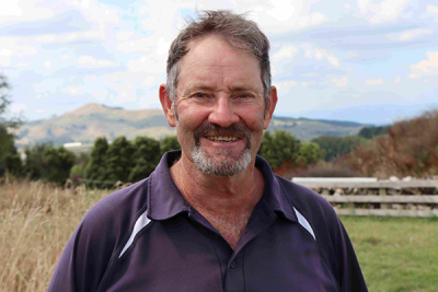 Mid shot of Farmer Ian - He says the gullies on his property weren’t suited for grazing so he planted a native forest
