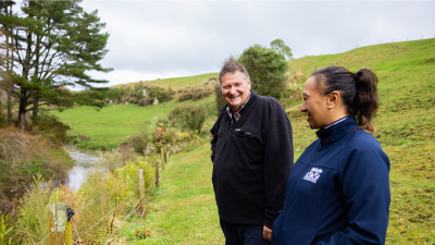 Image - farmer and Waikato Regional Council staff looking at riparian planting