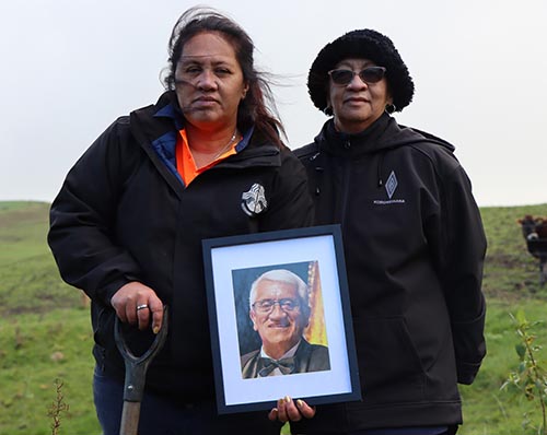 Image - Hine Thompson took a photo of her late husband, Anaru Thompson, to the final planting of the restoration project.